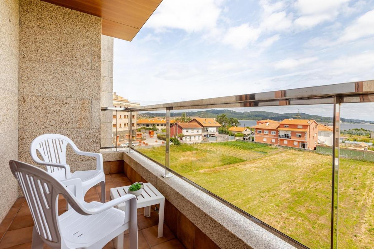 Apartamento Acogedor En La Playa De La Lanzada 산신소 외부 사진
